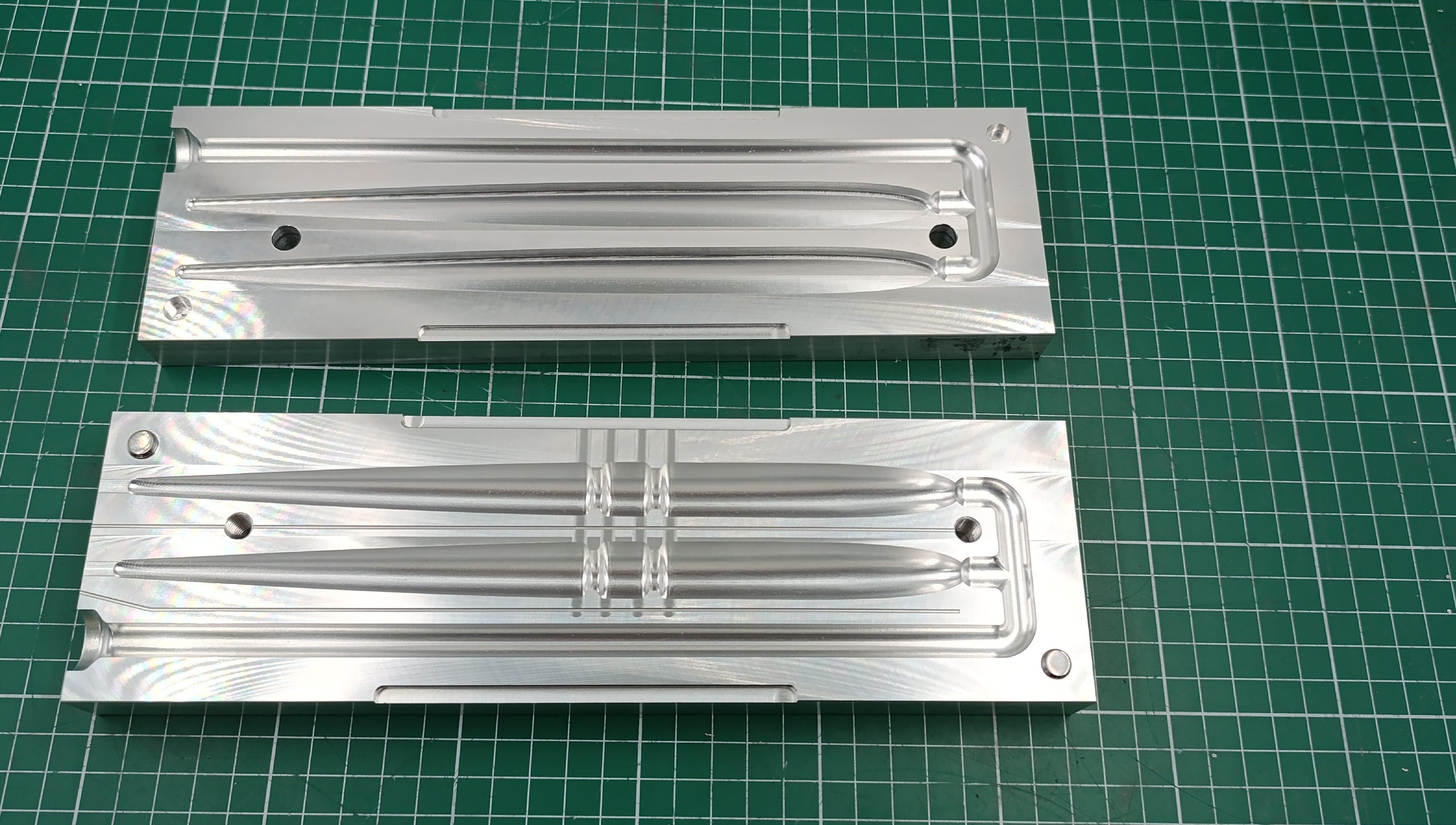 CNC machined two cavity 9 inch slug go lure aluminum mold