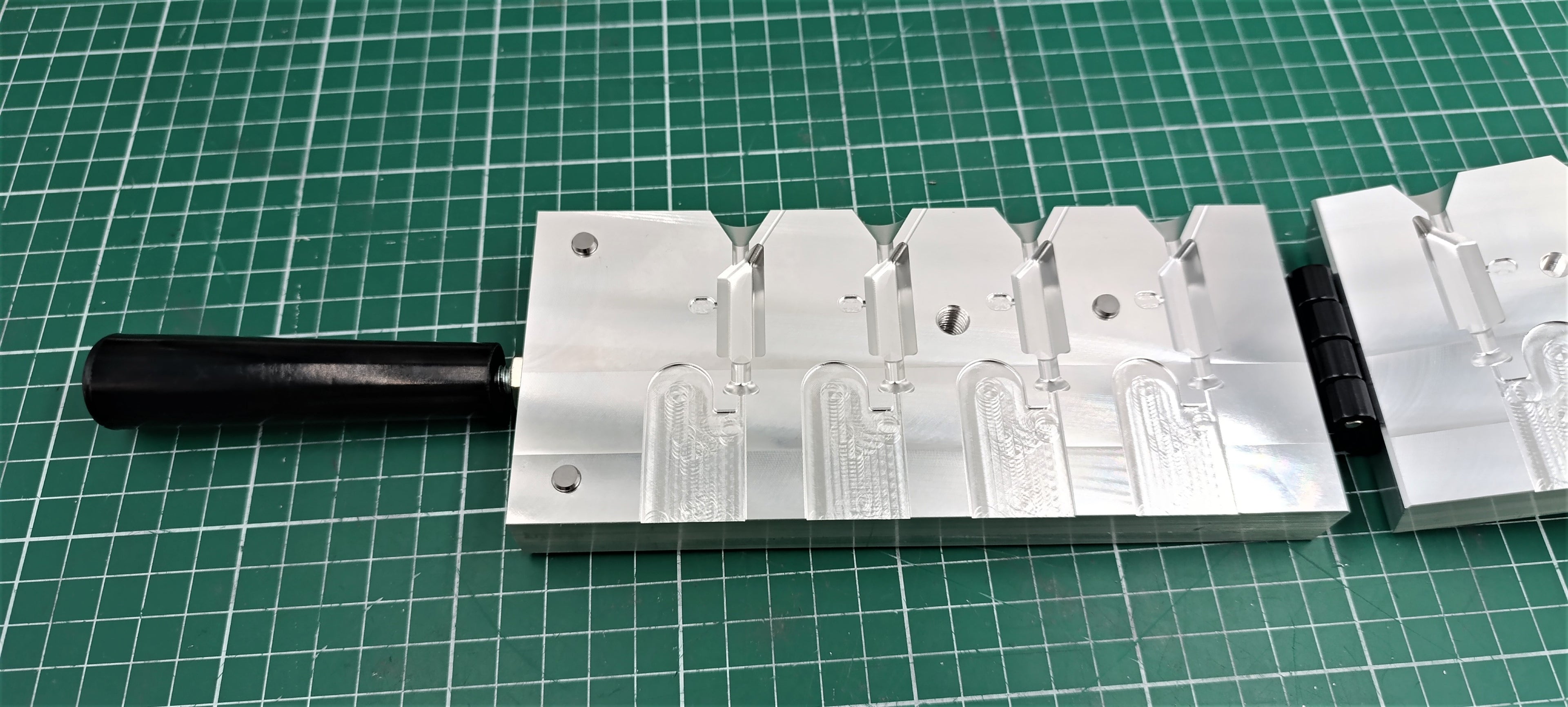 CNC machined 1 oz hexagonal jig head aluminum mold, CNC machining services