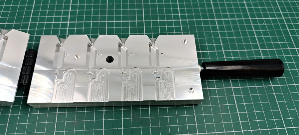 CNC machined 1 oz hexagonal jig head aluminum mold, CNC machining services