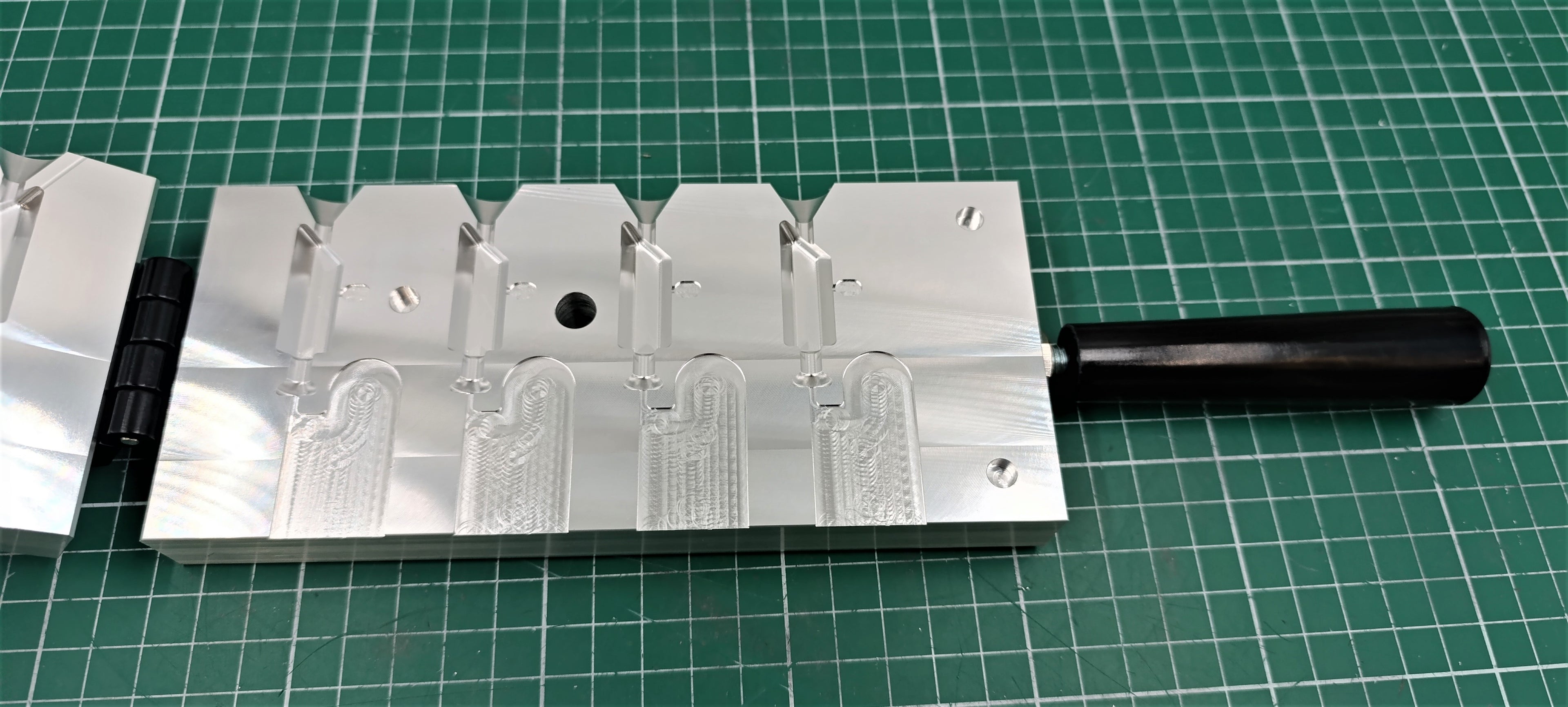 CNC machined 1 oz hexagonal jig head aluminum mold, CNC machining services