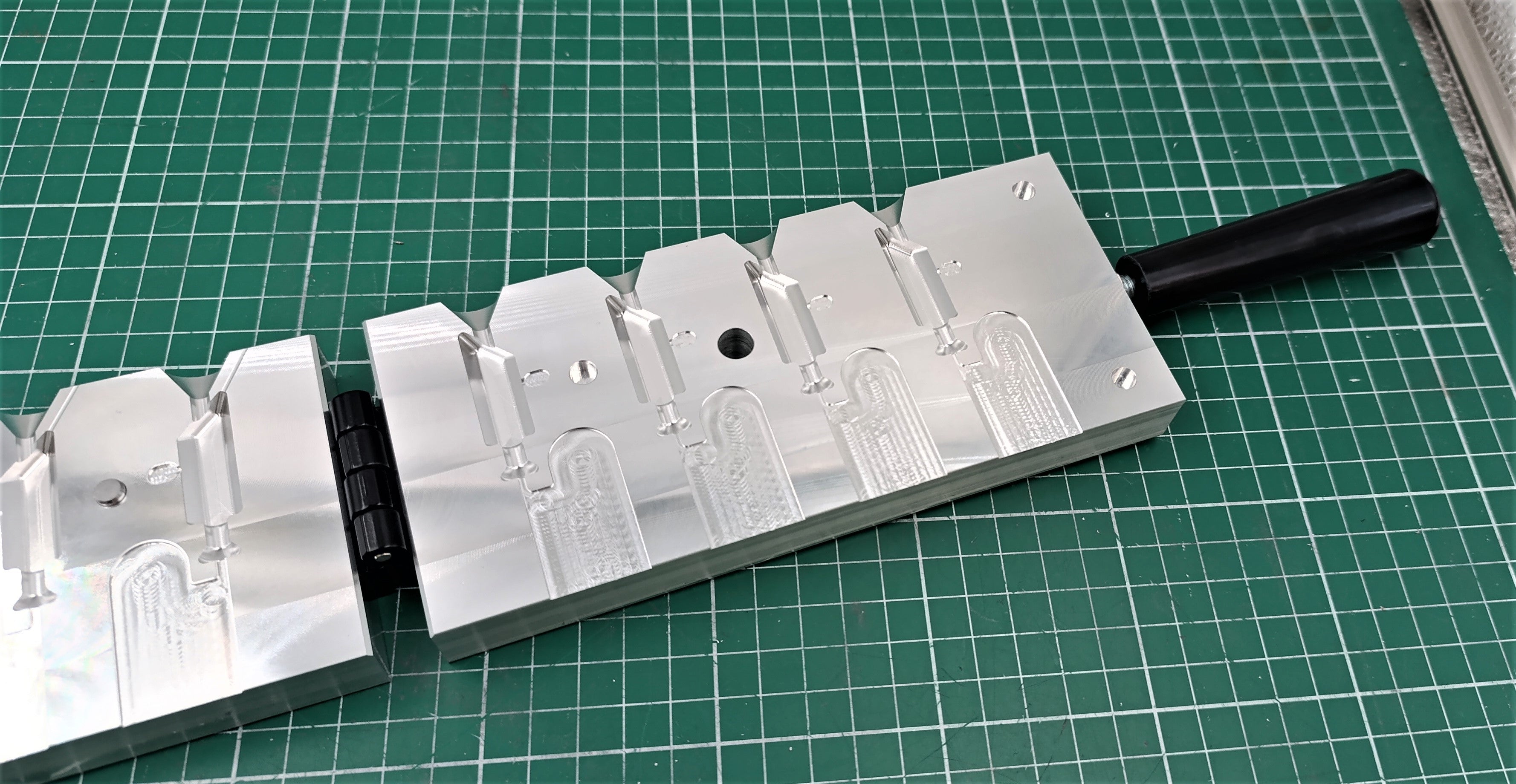 CNC machined 1 oz hexagonal jig head aluminum mold, CNC machining services