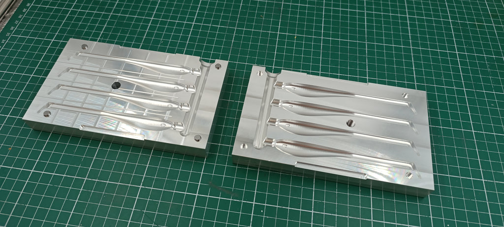 Four cavity CNC machined aluminum mold for 5" twitching shad lure production
