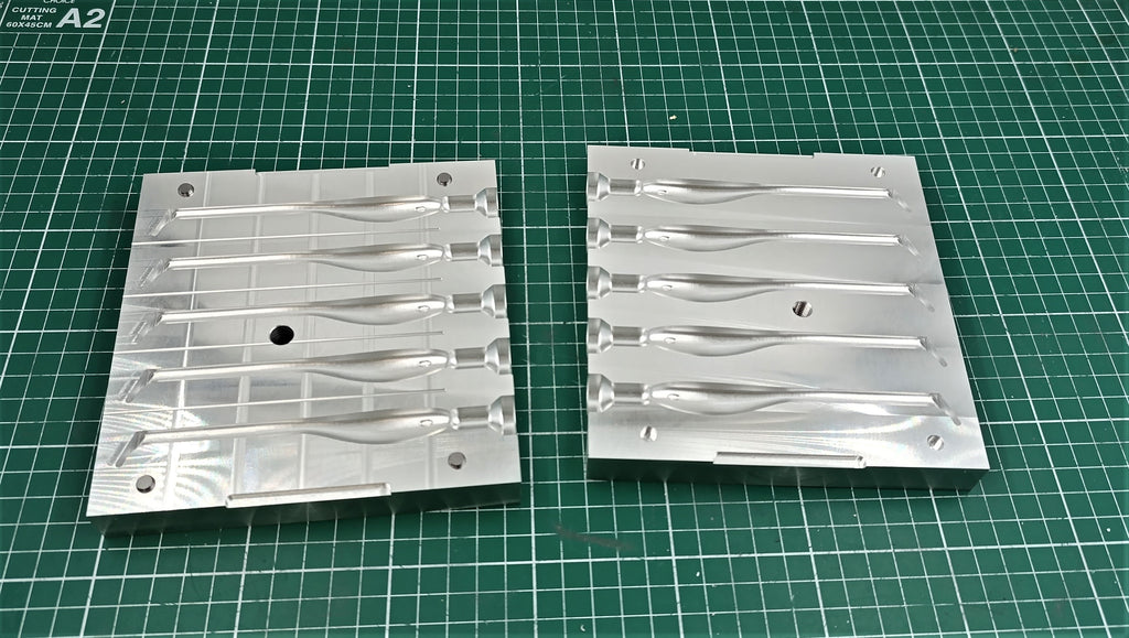 Five cavity CNC machined aluminum mold for 4.5" twitching shad lure production