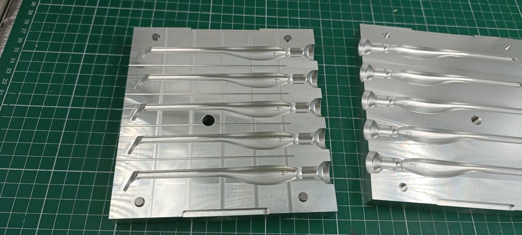 Five cavity CNC machined aluminum mold for 4.5" twitching shad lure production