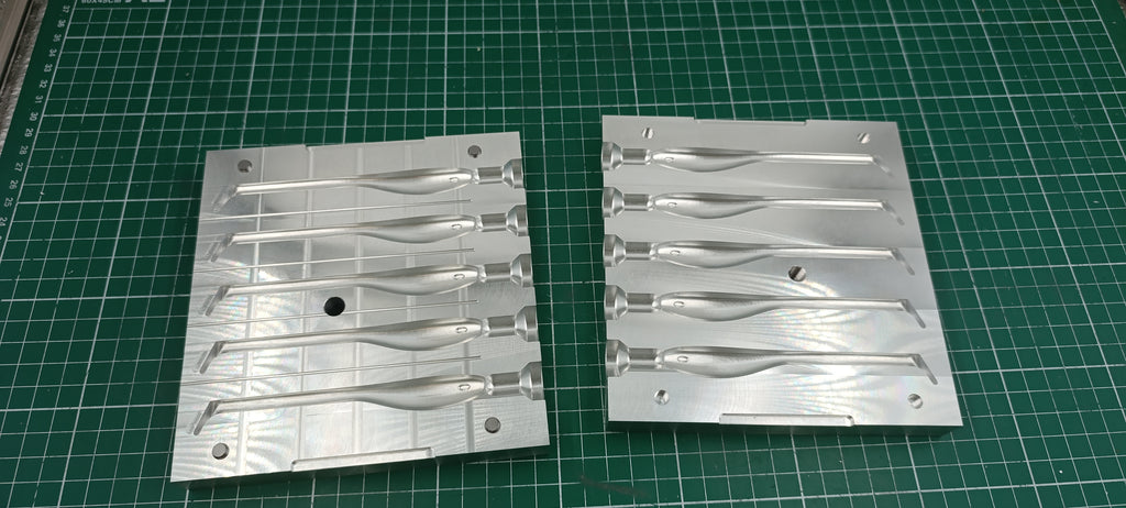 Five cavity CNC machined aluminum mold for 4.5" twitching shad lure production