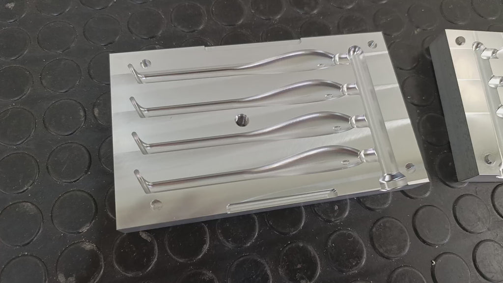 Four cavity CNC machined aluminum mold for 5" twitching shad lure production